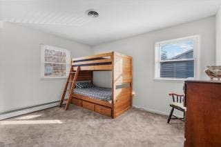 bedroom featuring light carpet