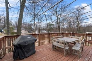 wooden deck with area for grilling