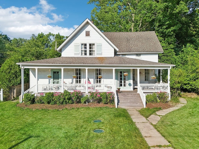 45 Shore Rd, East Setauket, NY 11733 - farmhouse-style home featuring covered porch, a front lawn, and a shingled roof