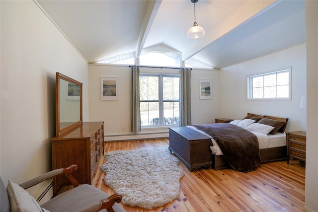 bedroom with vaulted ceiling, light hardwood / wood-style flooring, and baseboard heating