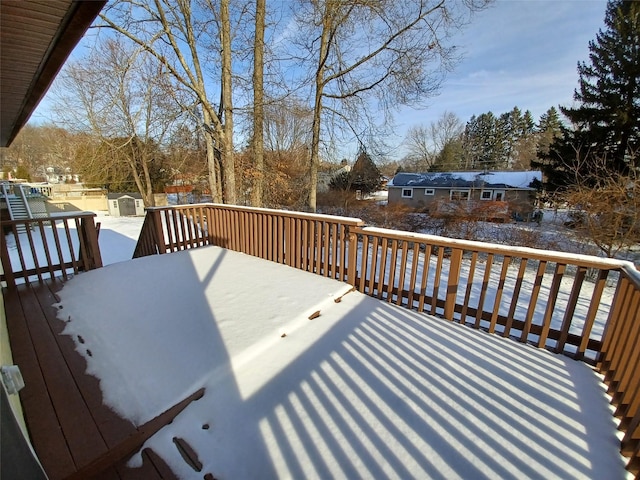 view of snow covered deck