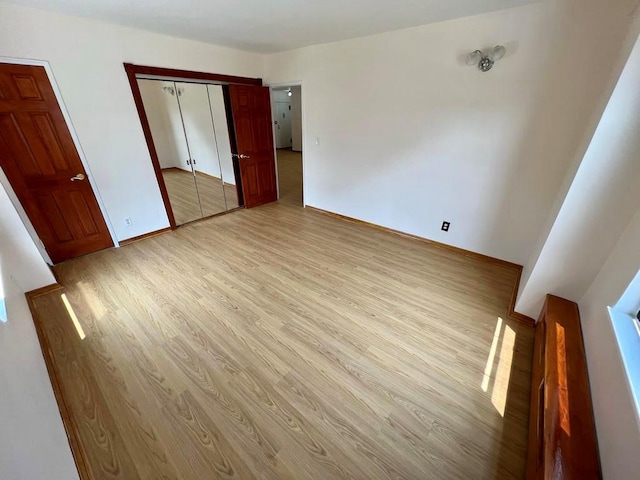 unfurnished bedroom with light hardwood / wood-style flooring