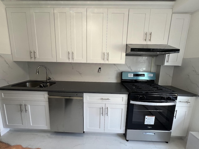 kitchen with white cabinetry, decorative backsplash, sink, and stainless steel appliances