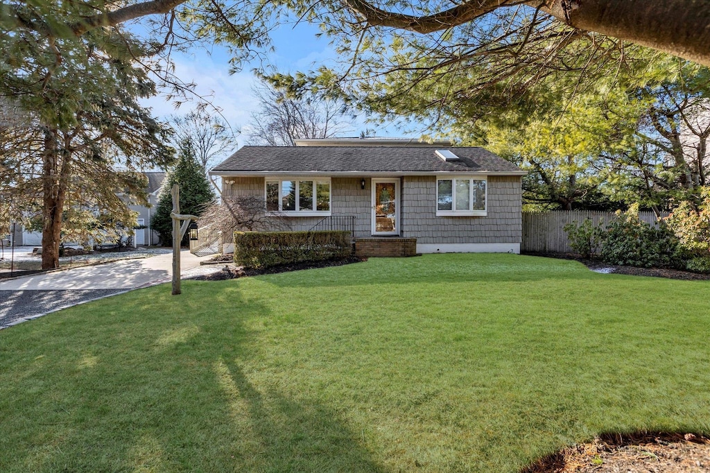 1820 Bay Shore Rd, Greenport, NY 11944 - view of front facade with driveway and a shingled roof
