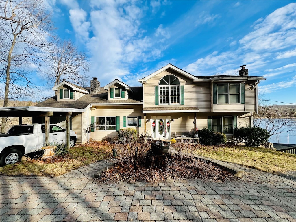 view of front of house featuring a carport