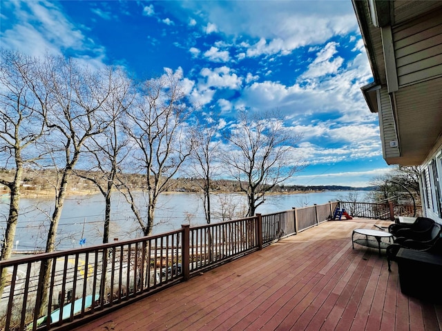 deck featuring a water view