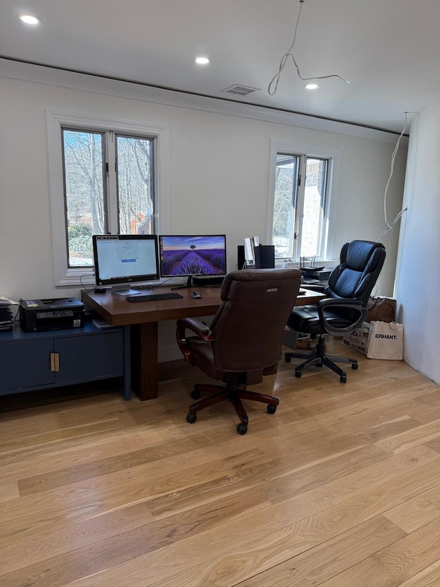 home office featuring light wood-style floors, recessed lighting, visible vents, and crown molding