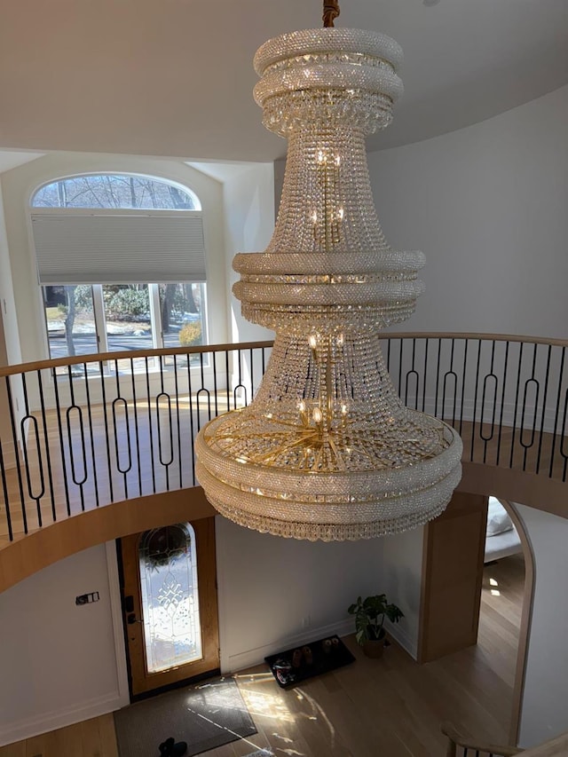 room details with a notable chandelier and wood finished floors