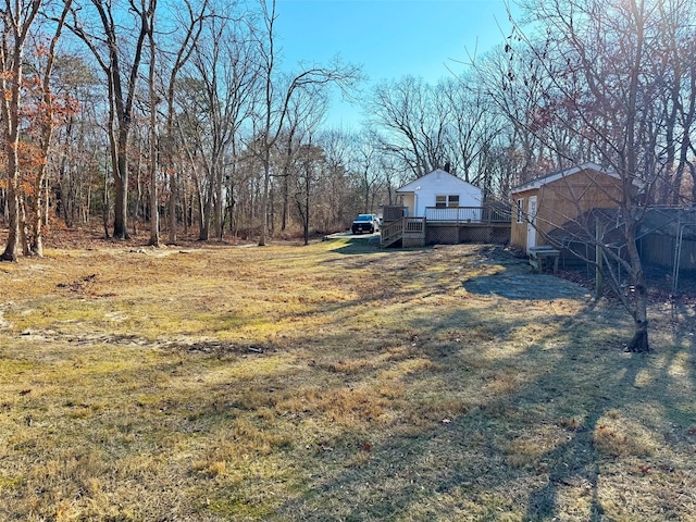 view of yard with a deck