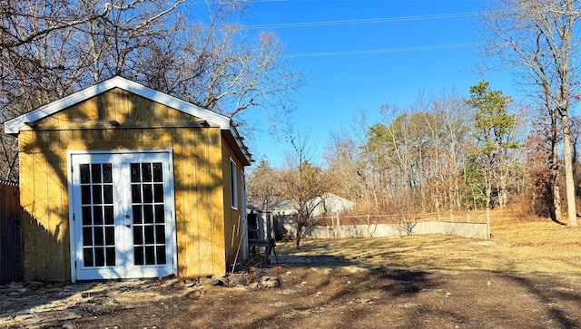 view of side of property featuring an outdoor structure