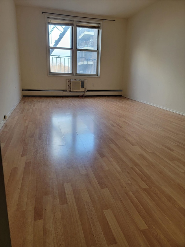 spare room with light wood-type flooring