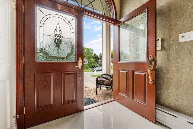 foyer featuring a baseboard radiator