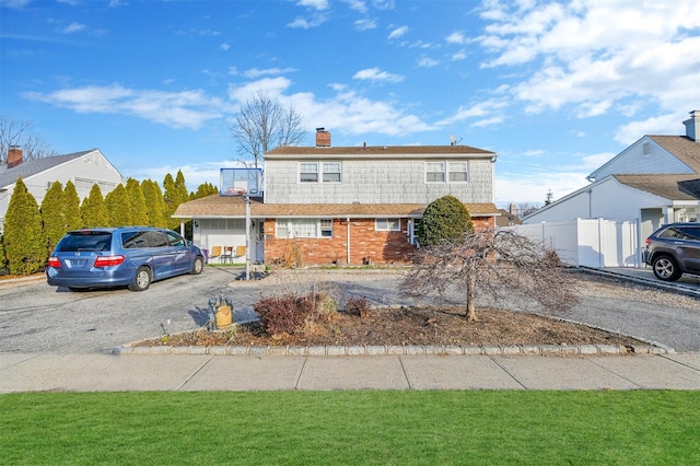 view of front facade with a front lawn