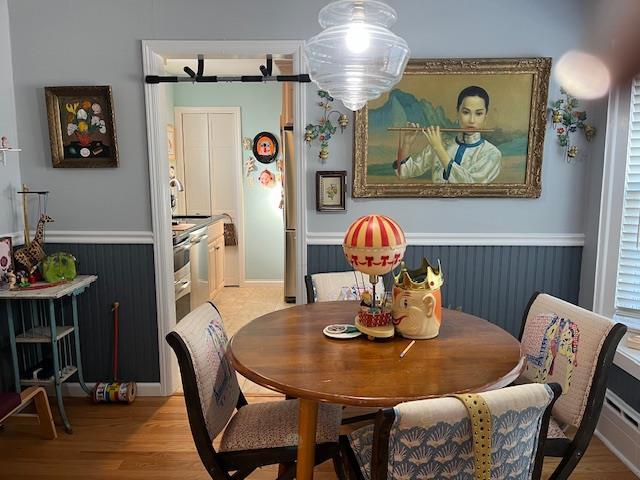 dining room featuring wood-type flooring