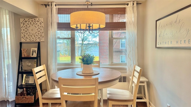 dining room featuring a notable chandelier