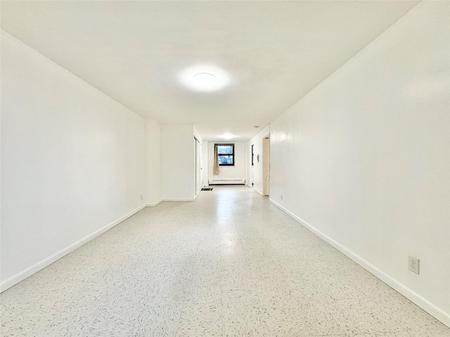 spare room with a baseboard radiator