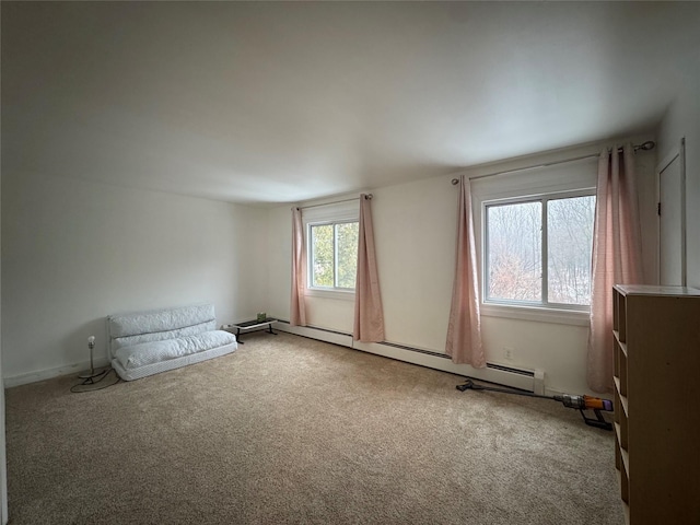 empty room with carpet floors and a baseboard radiator