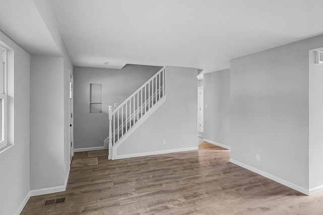 interior space with hardwood / wood-style floors