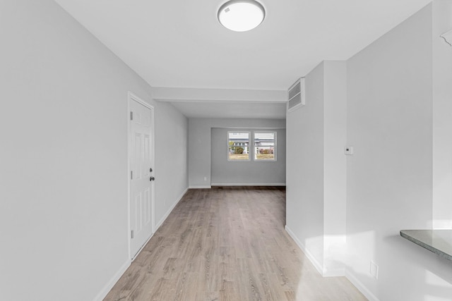 corridor featuring light wood-type flooring