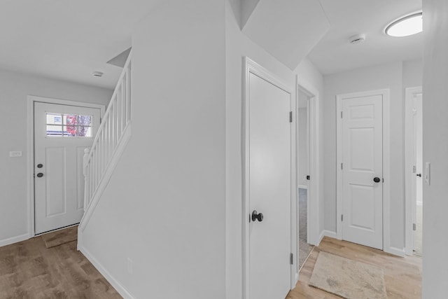 hallway featuring light hardwood / wood-style flooring