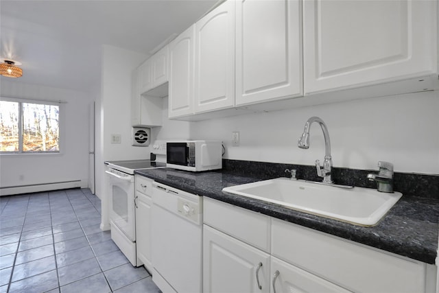 kitchen with sink, white appliances, white cabinetry, a baseboard heating unit, and light tile patterned flooring