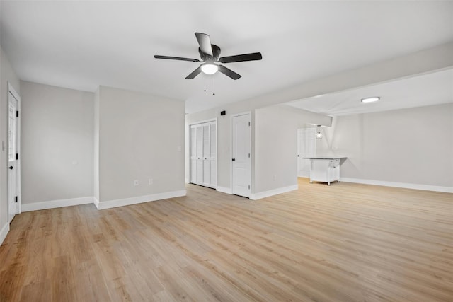 interior space featuring light hardwood / wood-style floors and ceiling fan