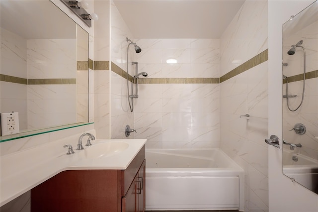 bathroom with vanity and tiled shower / bath combo