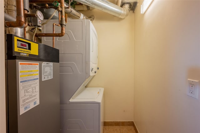 laundry room featuring stacked washer / dryer