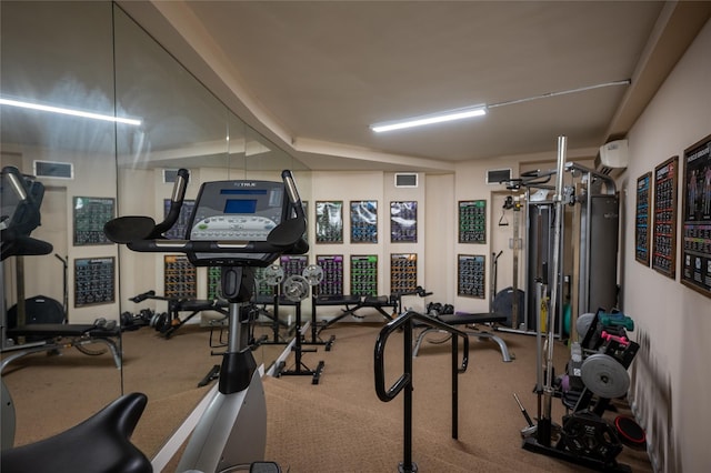 gym with a wall mounted air conditioner