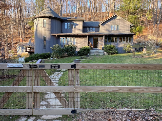 view of front of home with a front lawn