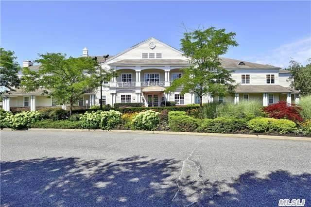 view of front of property with a balcony