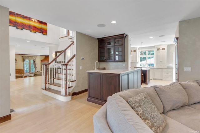 interior space featuring light hardwood / wood-style flooring and sink