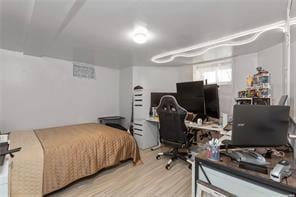 bedroom with light hardwood / wood-style floors