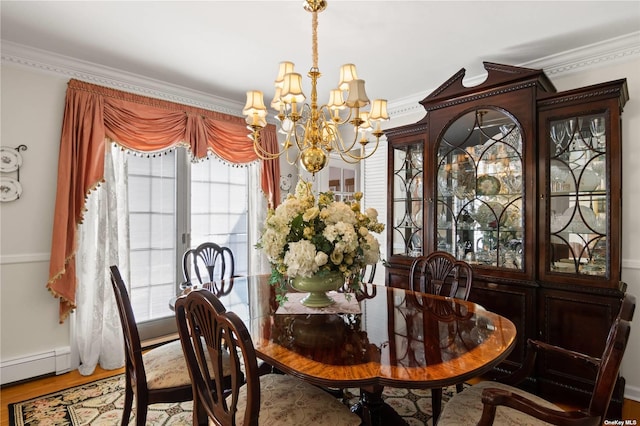 dining room with ornamental molding, hardwood / wood-style flooring, a baseboard radiator, and a notable chandelier