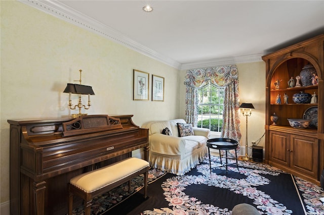 living area featuring ornamental molding