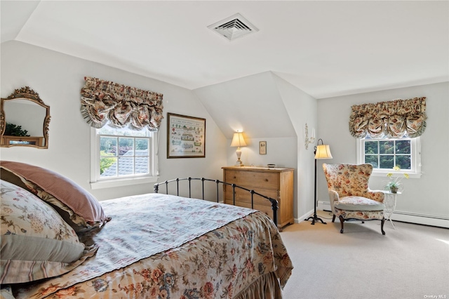 carpeted bedroom with lofted ceiling