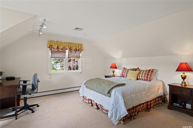 bedroom with baseboard heating, carpet floors, and vaulted ceiling