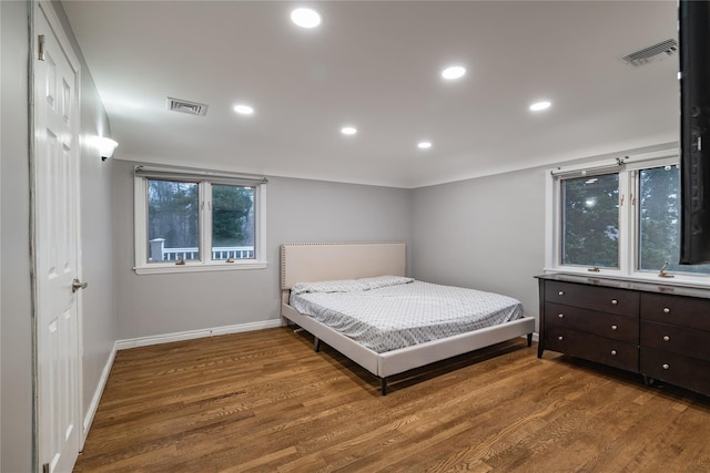 bedroom featuring dark hardwood / wood-style floors