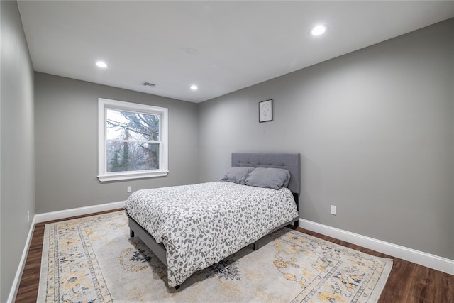 bedroom featuring wood-type flooring