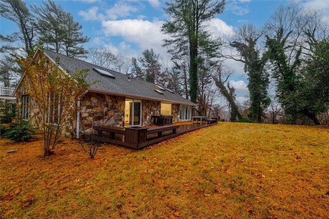 view of yard featuring a deck