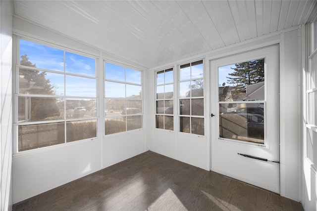 unfurnished sunroom with wood ceiling