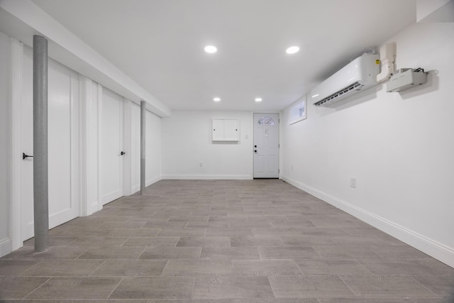 basement featuring an AC wall unit