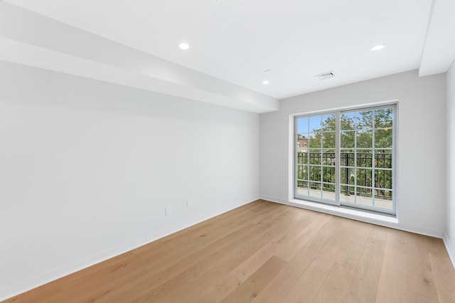 unfurnished room featuring light wood-type flooring