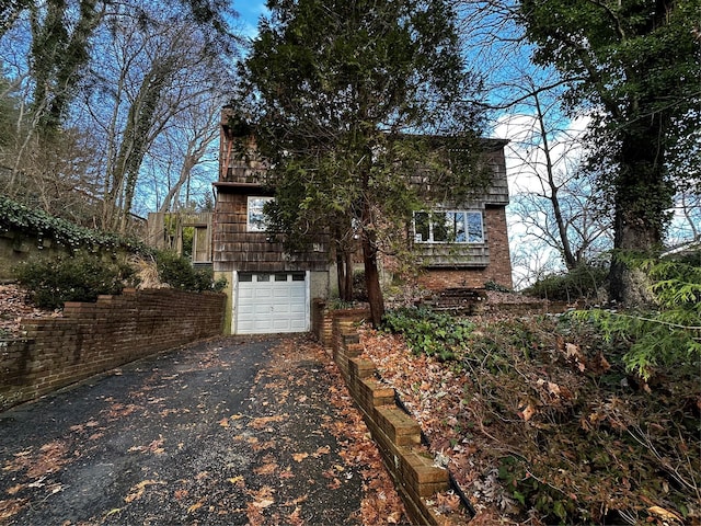 view of front of property featuring a garage