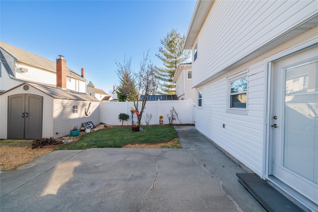 view of patio / terrace with a storage unit