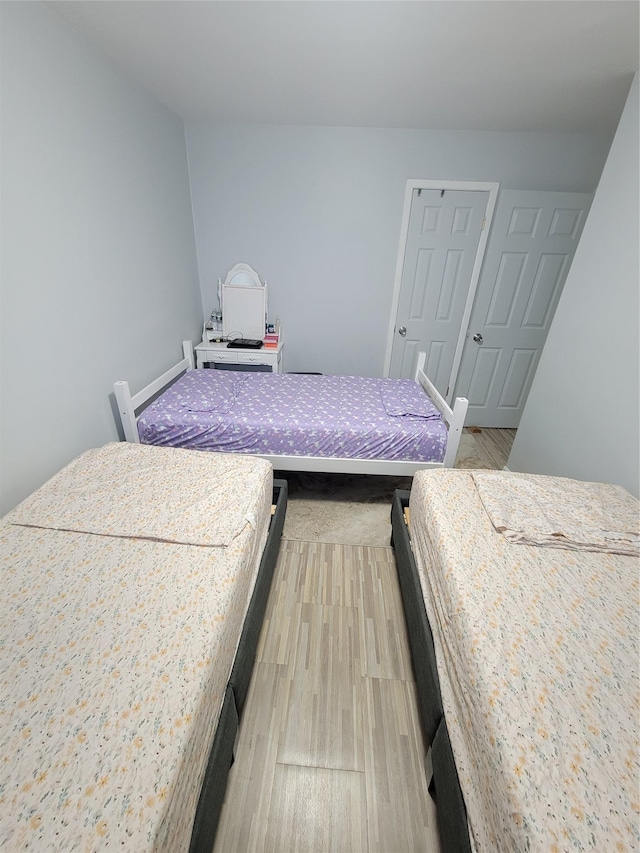 bedroom featuring wood-type flooring