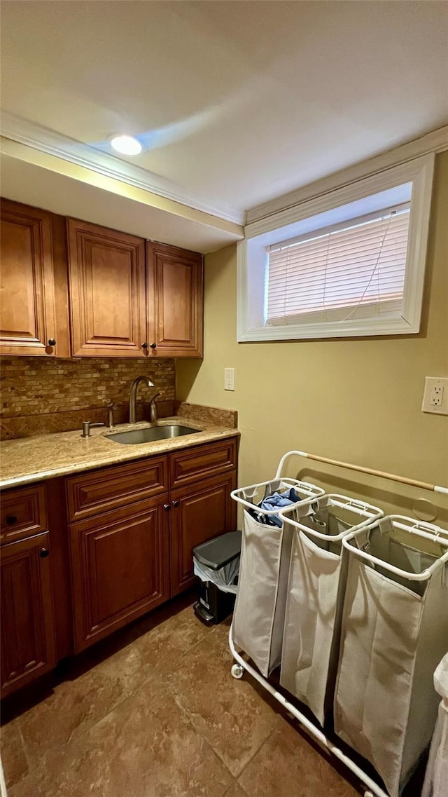 kitchen with tasteful backsplash and sink