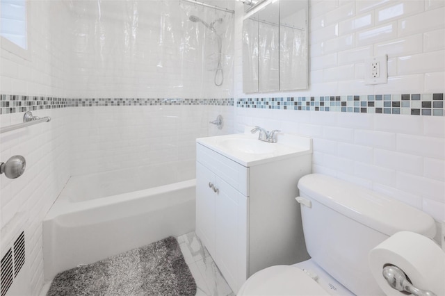 full bathroom with shower / bath combo, toilet, tile walls, and vanity