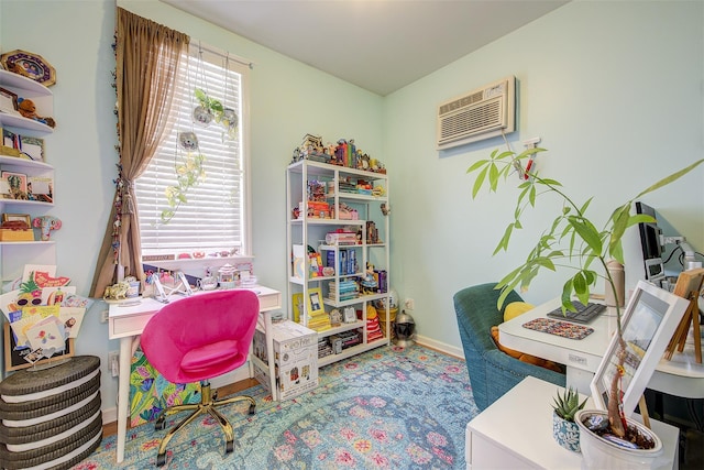 home office featuring plenty of natural light and a wall mounted AC