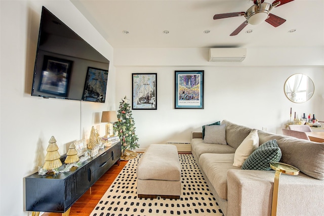 living room with ceiling fan, an AC wall unit, dark hardwood / wood-style floors, and baseboard heating